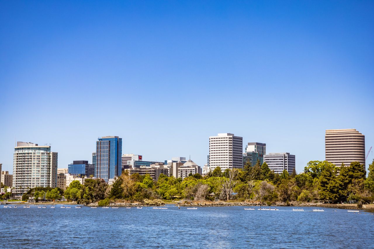 Oakland skyline across Lake Merritt on a sunny day