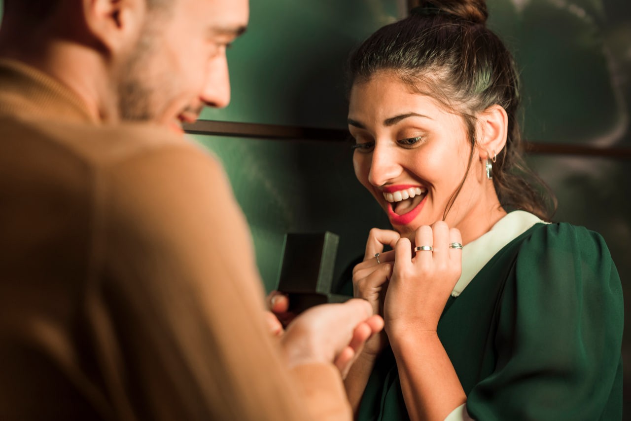 Man dating a mexican woman, sharing a romantic moment