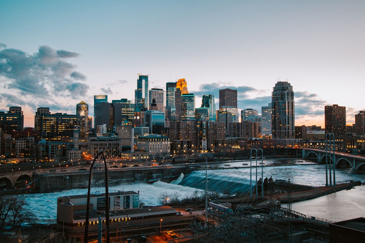 Minneapolis skyline over the Mississippi River at dusk