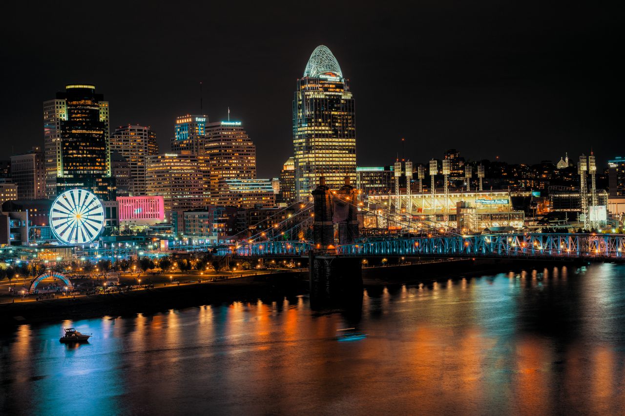 Cincinnati skyline and riverfront lit up at night