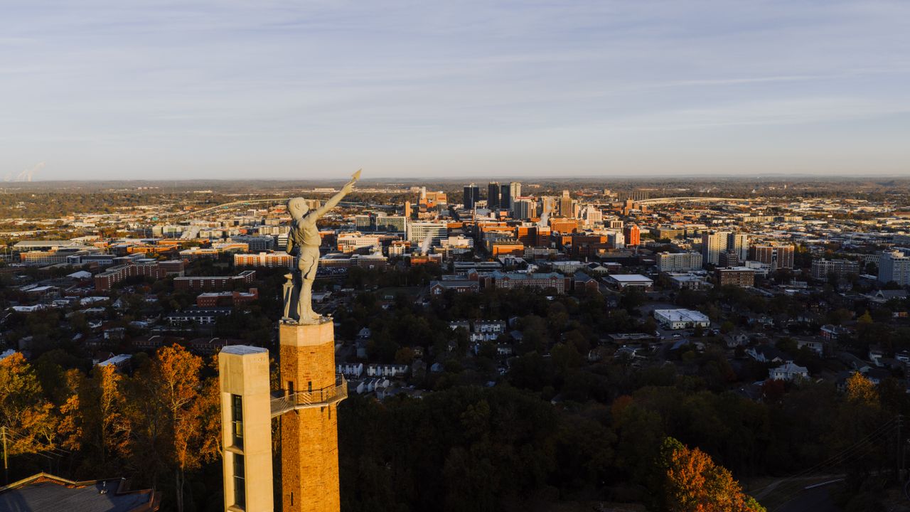 Vulcan statue overlooking Birmingham at sunset