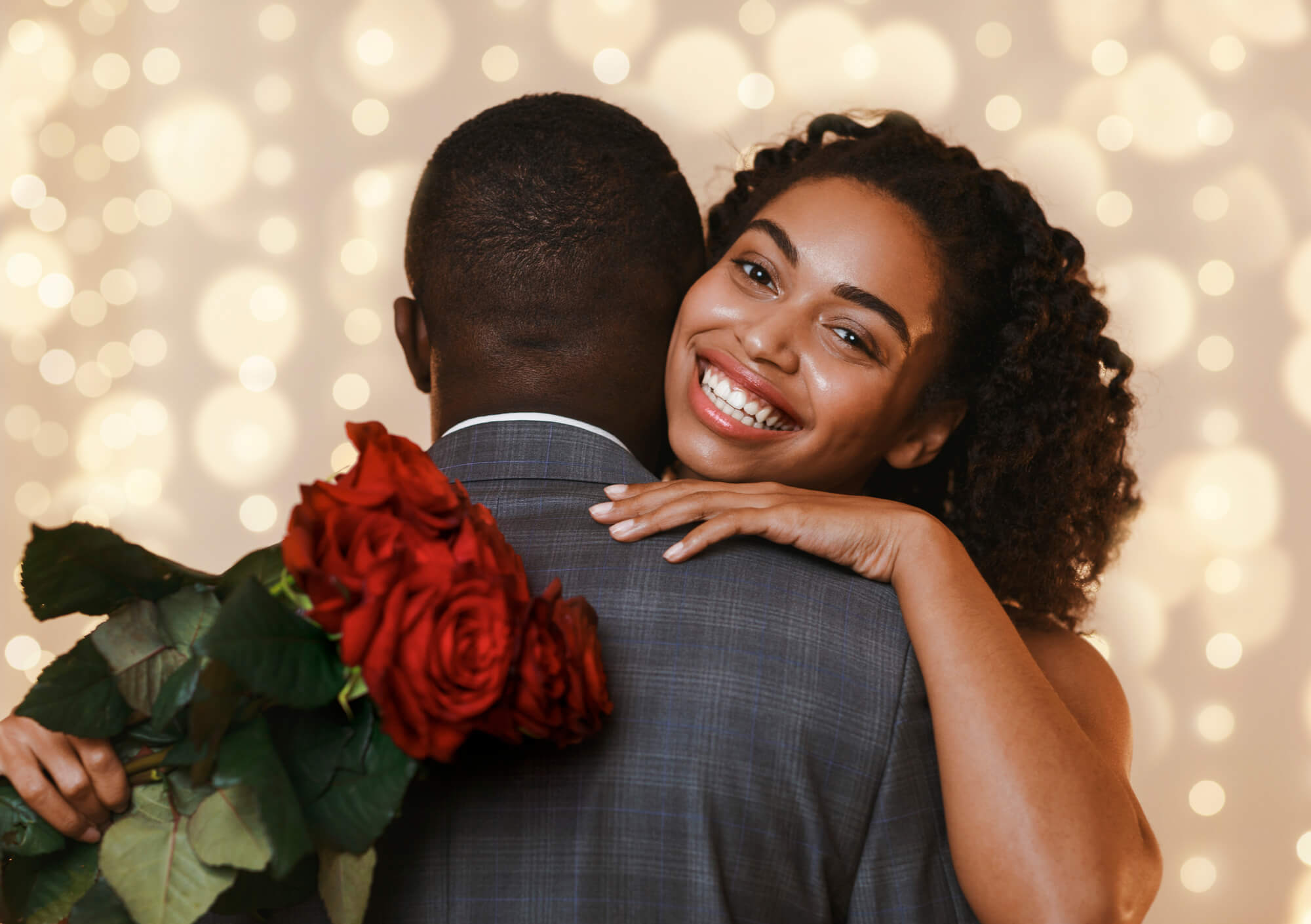 boy giving flowers to girl