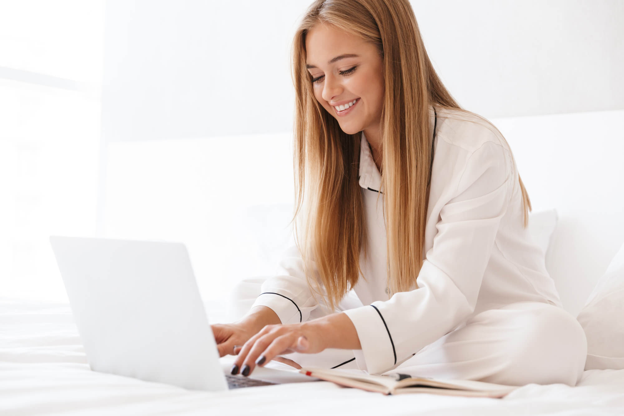 girl chatting online on laptop